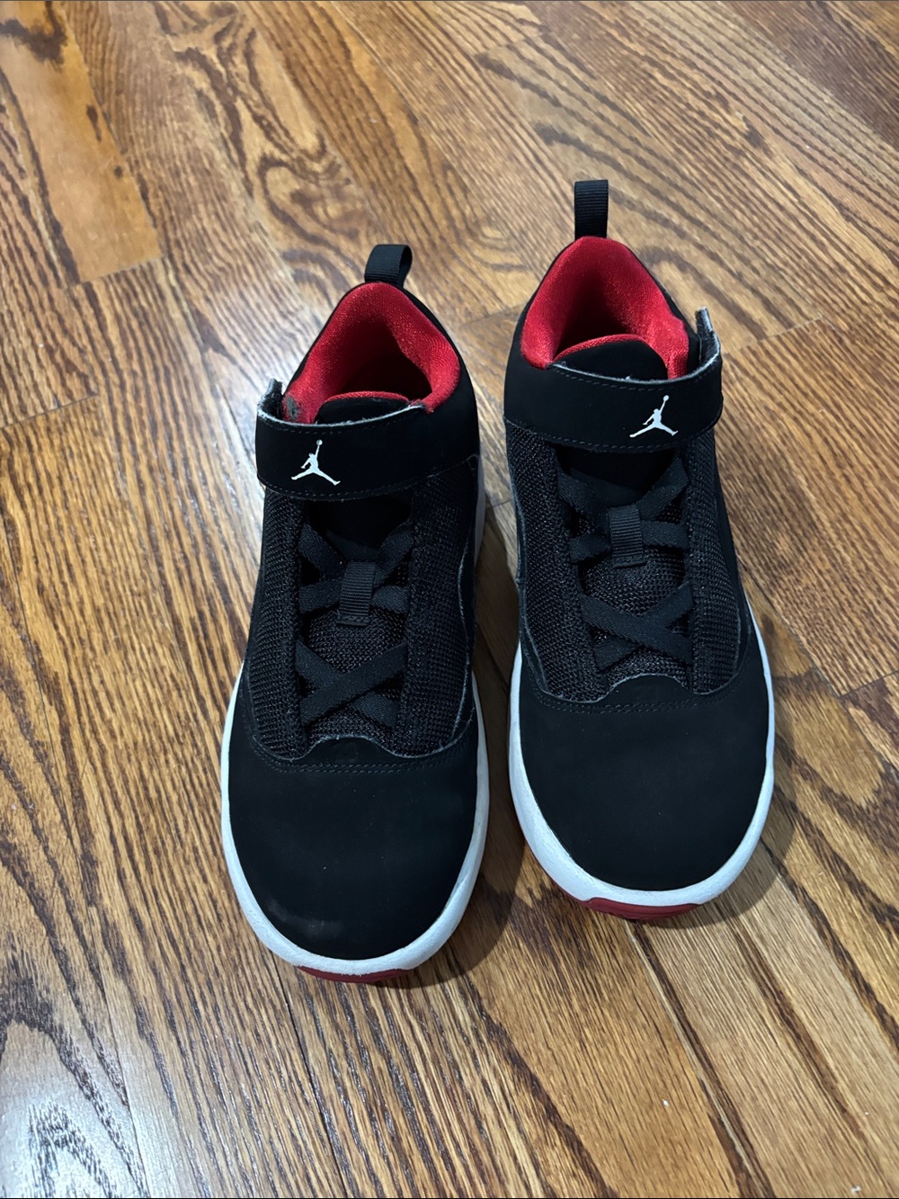 Jordan Kids Black and Red Sneakers with White Sole
